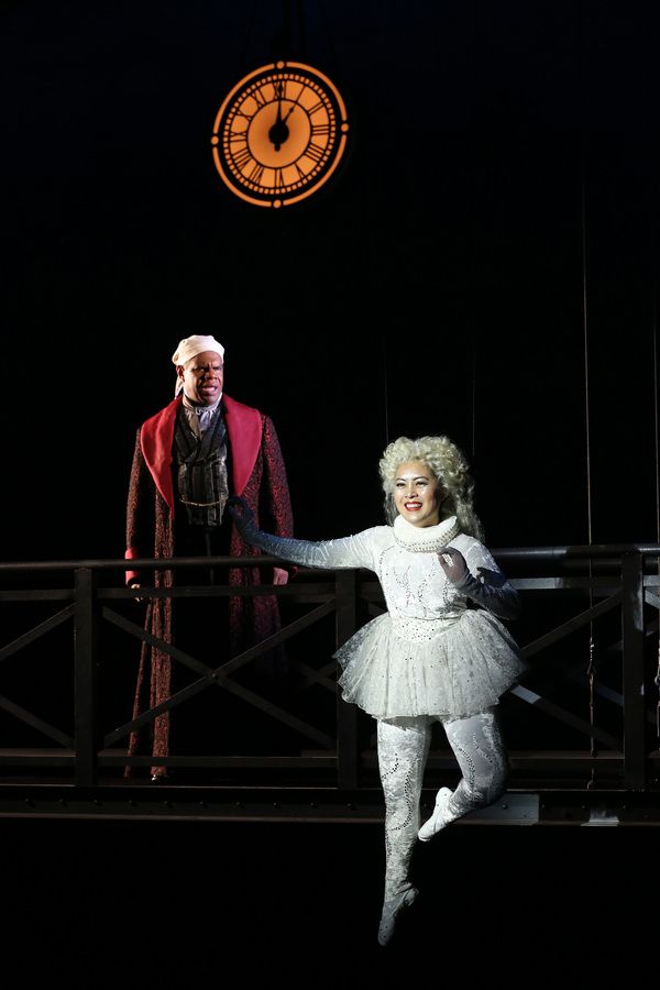 Craig Wallace as Ebenezer Scrooge and Justine 'Icy' Moral as Ghost of Christmas Past Photo