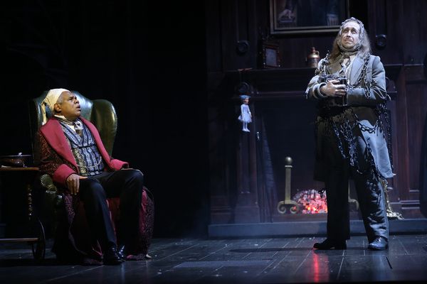 Craig Wallace as Ebenezer Scrooge and James Konicek as Jacob Marley Photo