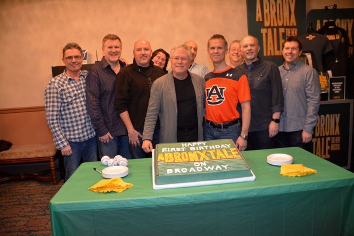 Alan Menkin with members of the orchestra at 