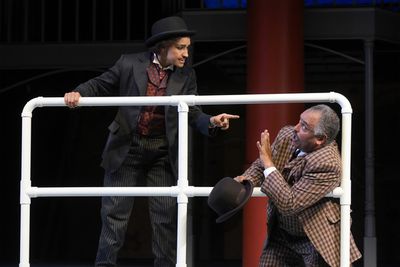 L-R: Passepartout (Tristan Cunningham) challenges Detective Fix (Michael Gene Sulliva Photo