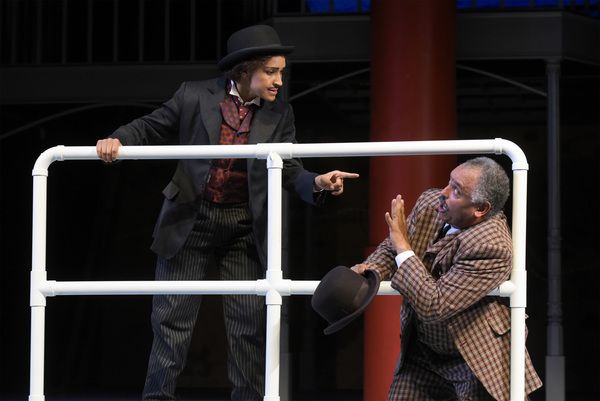 L-R: Passepartout (Tristan Cunningham) challenges Detective Fix (Michael Gene Sulliva Photo