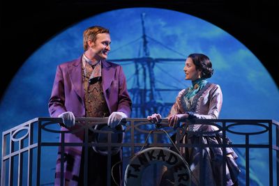 L-R: Phileas Fogg (Jason Kuykendall) and Aouda (Ajna Jai) travel by ship in TheatreWo Photo