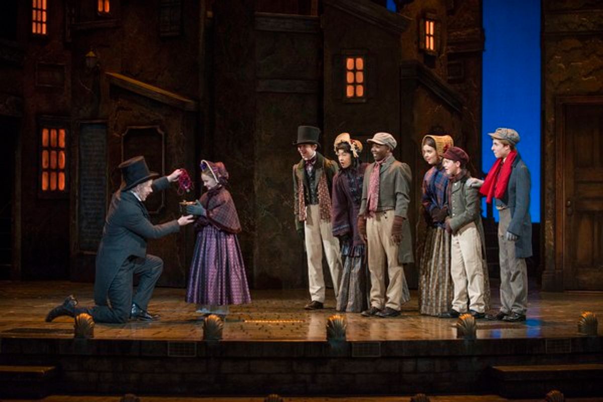 Milwaukee Repertory Theater presents A Christmas Carol in the Historic Pabst Theater from November 28 to December 24, 2017. Left to Right: Jonathan Wainwright, Olivia Vitrano, Tighe Leszczynski, Kia Liebenstein, Jakobie Jackson, Tory Trettin, Jack Trettin at 