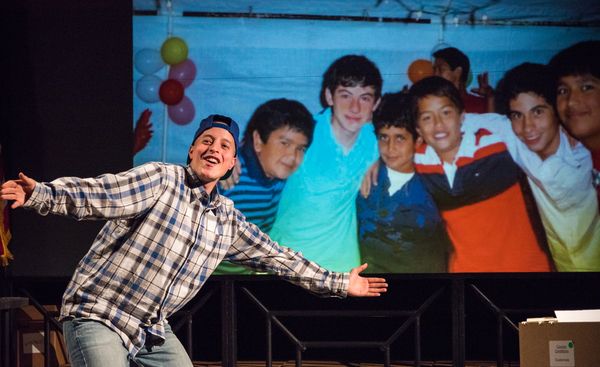 Manny UreÃ±a in front of photo image shot by Donna DeCesare Photo