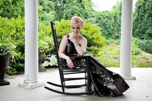 Doreen Taylor sits in a rocking chair on the same spot Oscar Hammerstein sometimes wrote on his porch in Doylestown, PA @ BroadwayWorld Doreen Taylor sits in a rocking chair on the same spot Oscar Hammerstein sometimes wr Photo