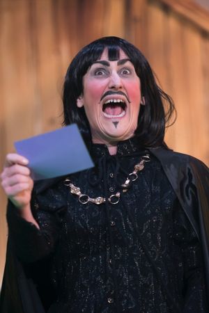 Kerry Frampton as The Sheriff of Nottingham in Robin Hood, Stantonbury Theatre Photo