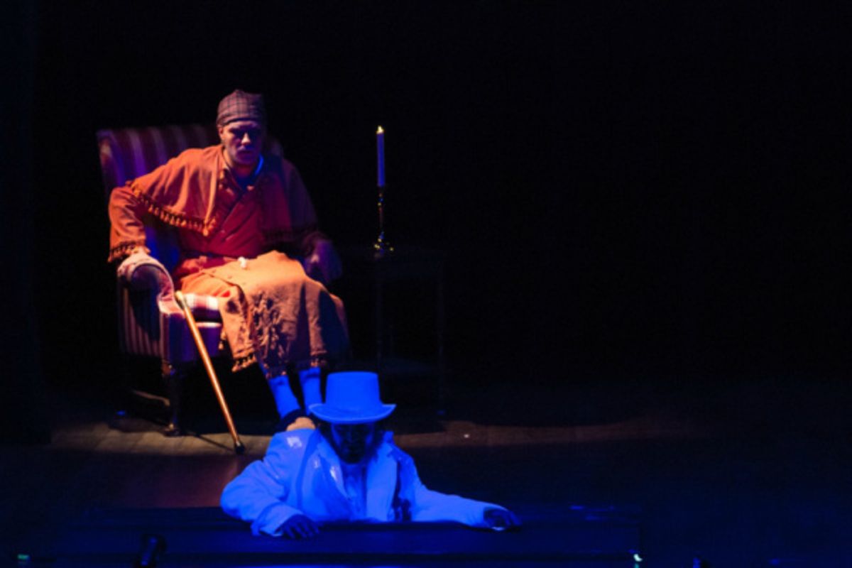 Scrooge (Eric Fletcher) receives a visit from his old partner Jacob Marley (Dustin Schlairet)

Photo by Martin Harris at 