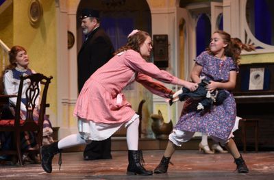 Agnes (Abby Knight) and Tootie (Wynter Osstifin) tussle over a doll in Meet Me in St. Photo