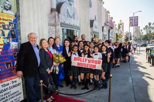 Dolores Missions students line up out side the Hollywood Museum for holiday tour, hos Photo