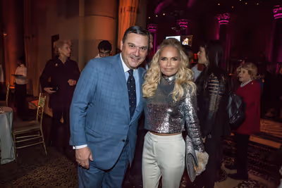 
President of the Metropolitan Opera Guild, Richard J. Miller, Jr. with artist Krist Photo