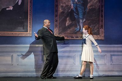 Lance Roberts as Oliver Warbucks and Carly Gendell as Annie
 Photo