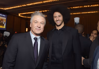 NEW YORK, NY - DECEMBER 13:  Alec Baldwin (L) and Colin Kaepernick attend Robert F. K Photo