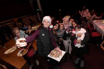 Sam Byram With Attendees Photo