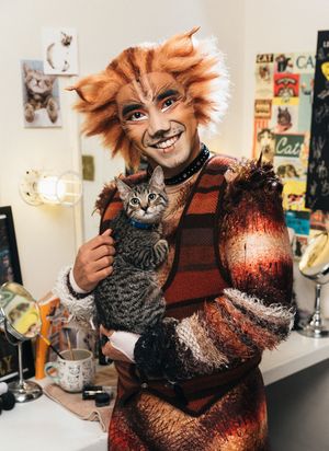 Aaron J. Albano of the CATS cast and an adoptable shelter kitten from The Humane Society of New York @ BroadwayWorld Aaron J. Albano of the CATS cast and an adoptable shelter kitten from The Humane Soci Photo
