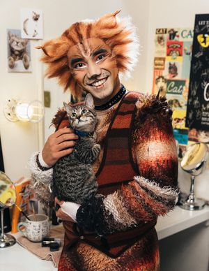 Aaron J. Albano of the CATS cast and an adoptable shelter kitten from The Humane Society of New York @ BroadwayWorld Aaron J. Albano of the CATS cast and an adoptable shelter kitten from The Humane Soci Photo