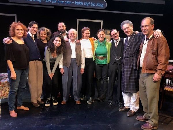 Rachel Grady & Heidi Ewing surrounded by the AWAKE AND SING! Company Photo