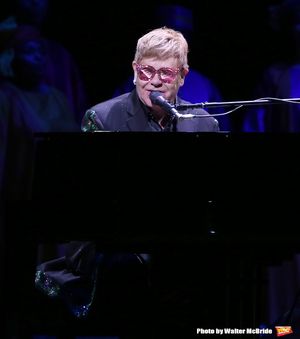Elton John performing during the Curtain Call for 20th Anniversary Performance of 'The Lion King' on Broadway at The Minskoff Theatre on November e, 2017 in New York City. @ BroadwayWorld Elton John performing during the Curtain Call for 20th Anniversary Performance of 'Th Photo