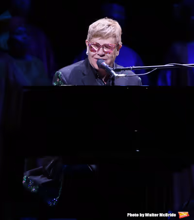 Elton John performing during the Curtain Call for 20th Anniversary Performance of 'Th Photo