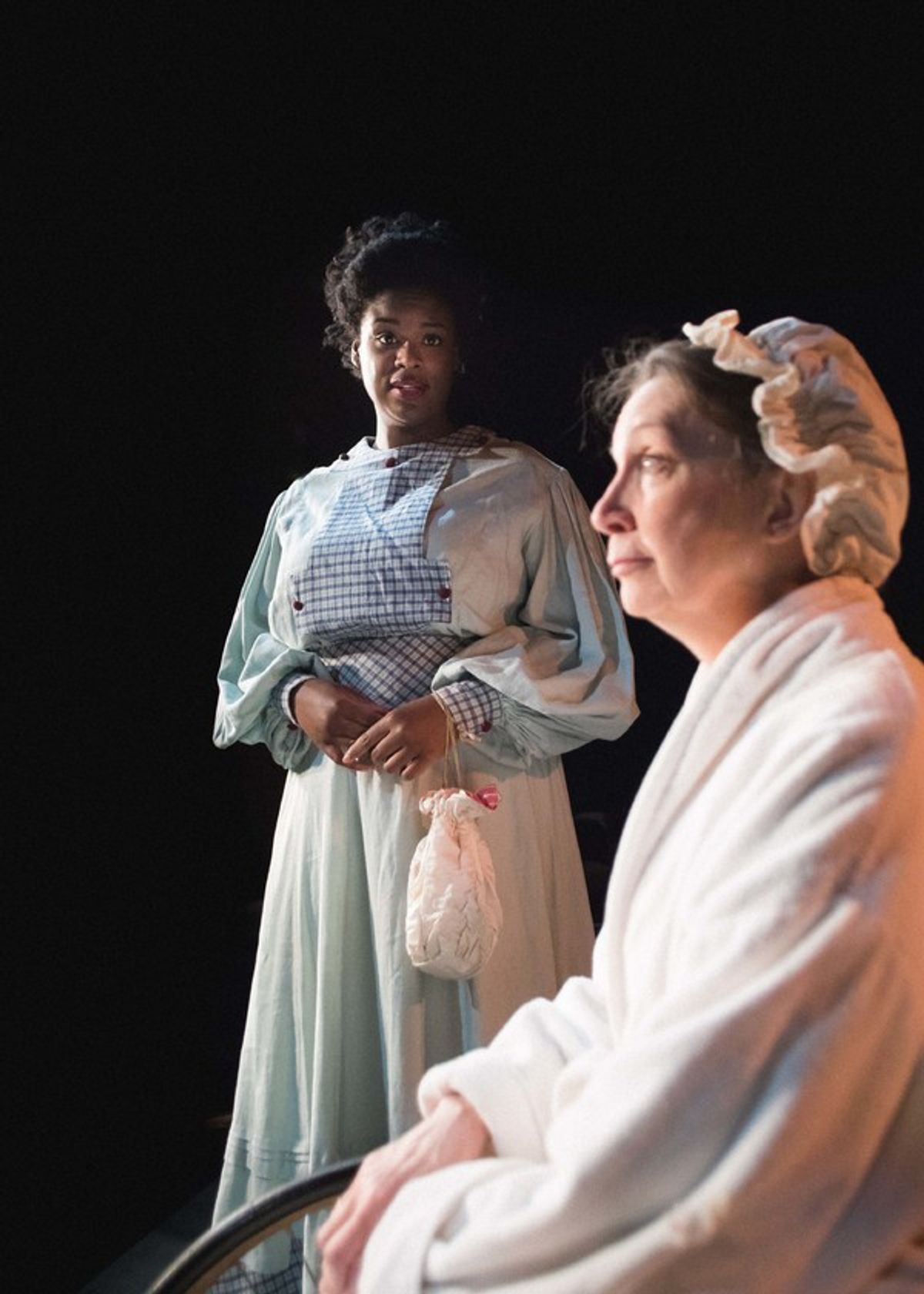 Seeking guidance, Emily Wilding Davison (Taylor Raye) visits a recuperating Emmeline Pankhurst (Jean Marie Koon) in Babes With Blades Theatre Companyâ€™s THE GOOD FIGHT at 