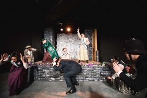 Hilda fires a gun to drive back the arresting officers at Emmeline Pankhurst's Glasgow speech. L to R: Gertrude (Scottie Caldwell), Grace Roe (Arielle Leverett), Mrs. Pankhurst (Jean Marie Koon), Inspector Gray (Joseff Stevenson), Mary (Elisabeth Del Toro @ BroadwayWorld Hilda fires a gun to drive back the arresting officers at Emmeline Pankhurst's Glasgo Photo