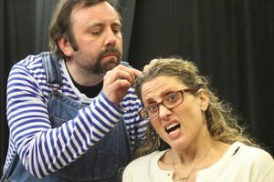 Eric Rupp, as Trevor the chimpanzee, treats his next-door neighbor, played by Jess St Photo