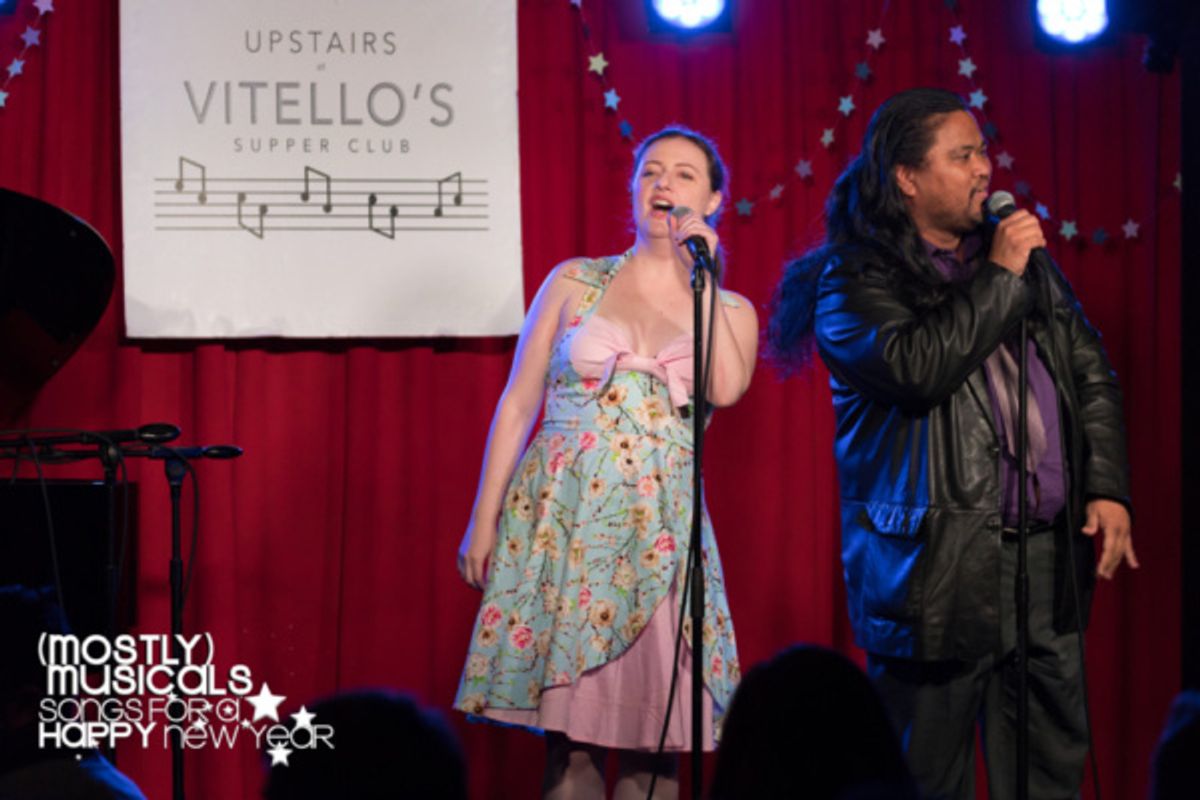 Jessica Reiner-Harris and Victor E. Chan lead the closing singalong: 3 Dog Night's Joy to the World (photo: Karl Sonnenberg) at 
