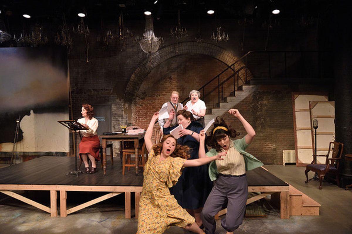 Left to right: Phyllis Kay as Celeste, Stephen Berenson as Stuart, Anne Scurria as Maggie, Janice Duclos as Winifred, Meghan Leathers as June and Rachael Warren as Grace in Into the Breeches! directed by Tyler Dobrowsky. Costume design by Olivera Gajic, s at 