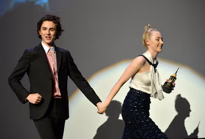 Actors Timothee Chalamet and Saoirse Ronan onstage at the Santa Barbara Award Honorin Photo