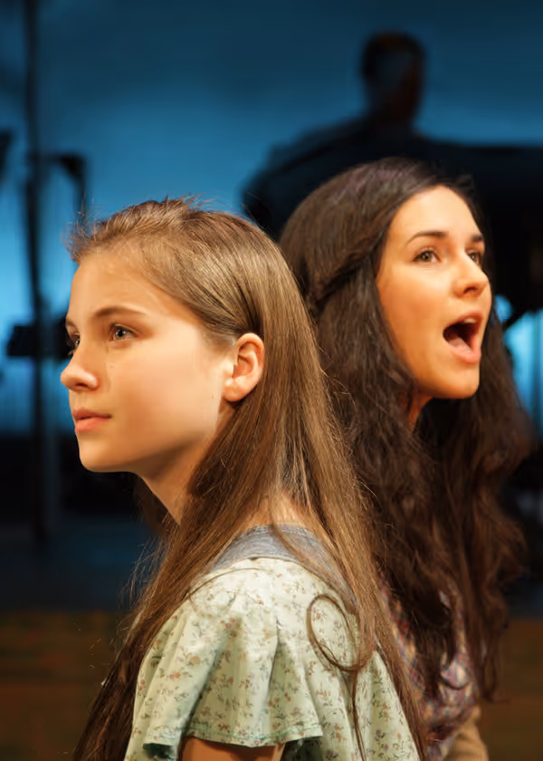 Rebeka Hoblik as Young Violet and Monika PeÃ±a as Violet Photo