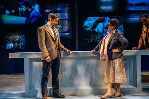 L-R: John D. Haggerty as The History Professor, Sharonlee McLean as The Mystery Novel Photo