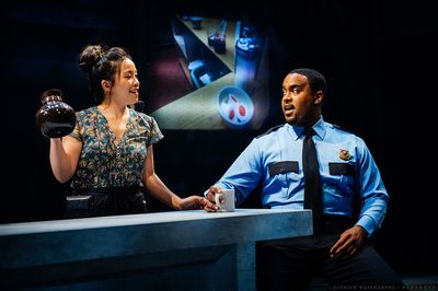Tina Chilip as The Waitress and Ryan Vincent Anderson as The Policeman in "Kodachrome Photo