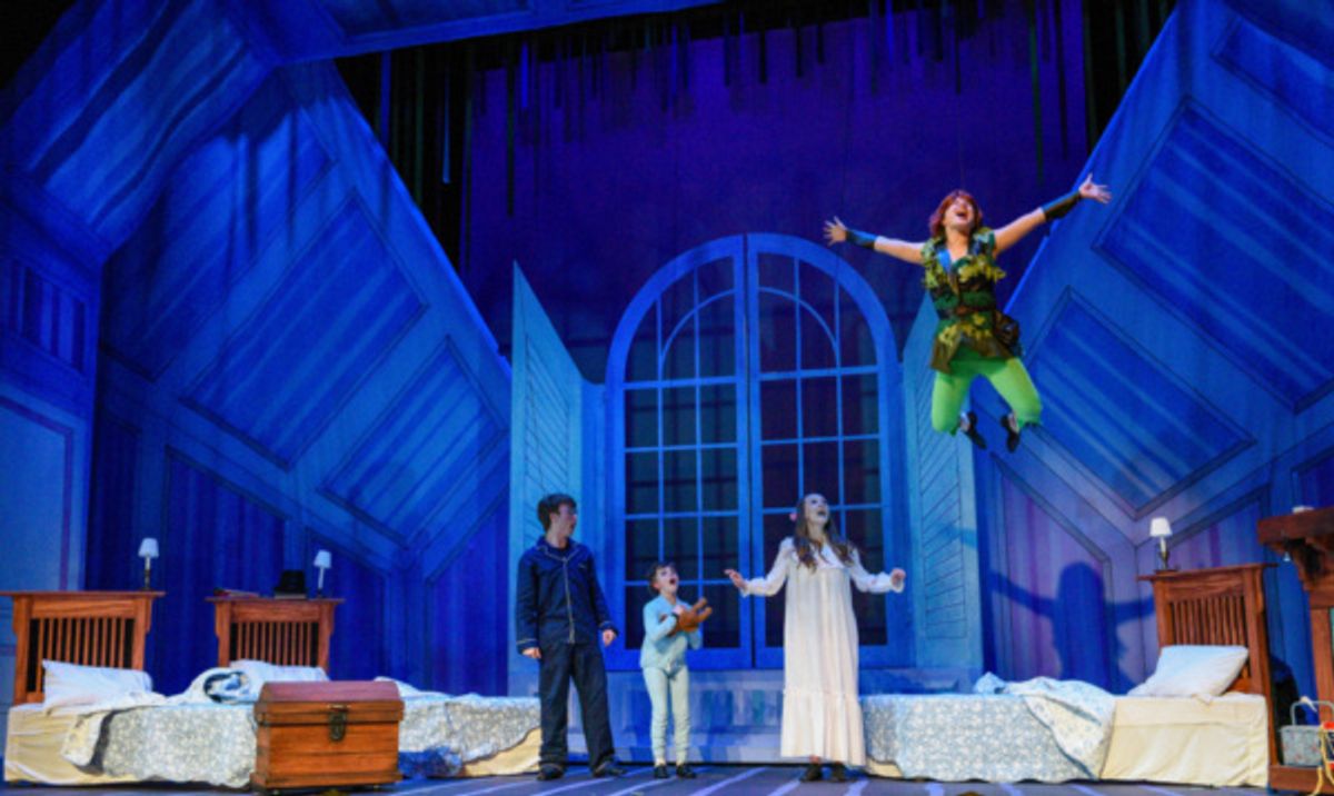 Peter (Hope Valls) teaches John (Fritz Van Winkle), Michael (Rodes Cole), and Wendy (Madison Thompson) to fly. at 