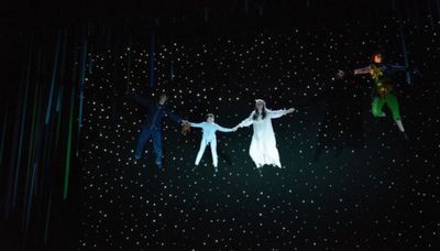 Peter (Hope Valls) teaches John (Fritz Van Winkle), Michael (Rodes Cole), and Wendy ( Photo