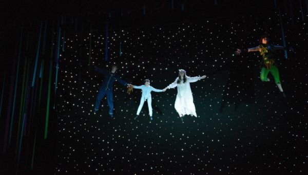 Peter (Hope Valls) teaches John (Fritz Van Winkle), Michael (Rodes Cole), and Wendy ( Photo