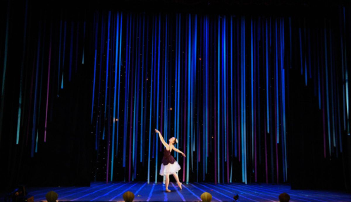 Liza (Christina Nastopoulos) lands in Neverland and meets the fairies. at The Lovett School Presents Colorful, Rambunctious PETER PAN