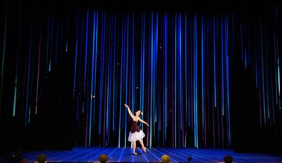Liza (Christina Nastopoulos) lands in Neverland and meets the fairies. Photo
