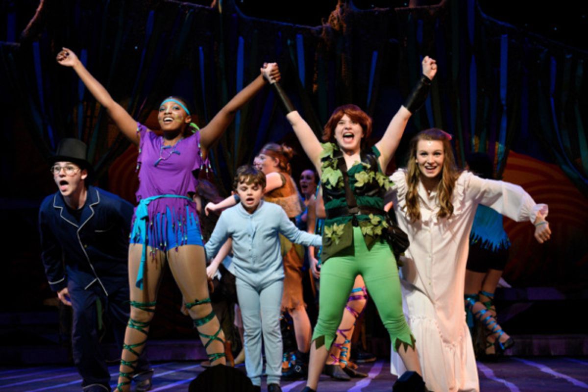 Peter (Hope Valls), the Darling Children (Rodes Cole, Madison Thompson, Fritz Van Winkle), and the Lost Boys make friends with Tiger Lily (Sanci Smith) and the Warriors in Ugg a Wugg. at 