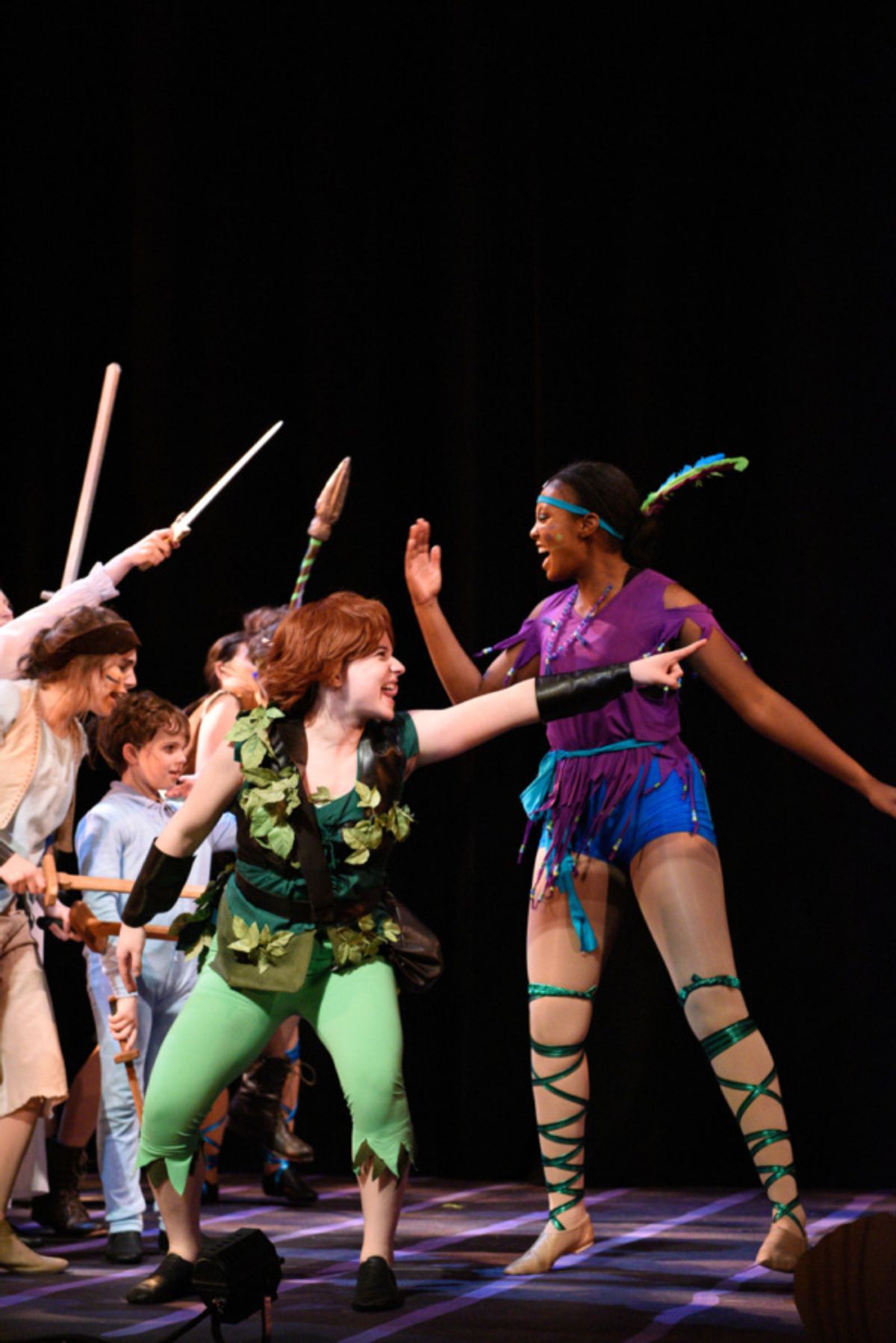 Peter (Hope Valls) and Tiger Lily (Sanci Smith) celebrate their defeat of the pirates. at 