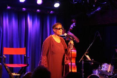Peggy Eason serenades Richard the house.  Photo
