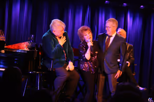 Anita Gillette gets between Richard and Daniel Sherman  Photo