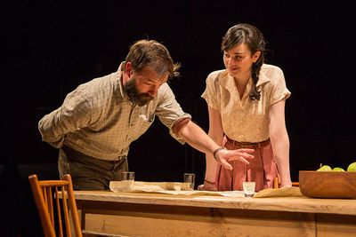 Jesse Pennington as Ãstrov and Celeste Arias as ElÃ©na in Uncle Vanya, translate Photo