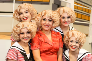 Sarah Porter as Reno Sweeney (center), surrounded by her Angels (clockwise from left) Alyssa Wolf, Larissa White, Michelle Sauer, and Sara Rae Womack, in New Line Theatre's ANYTHING GOES. Photo credit: Jill Ritter Lindberg.
@ BroadwayWorld Sarah Porter as Reno Sweeney (center), surrounded by her Angels (clockwise from left) Photo