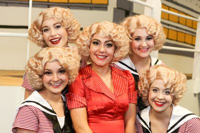 Sarah Porter as Reno Sweeney (center), surrounded by her Angels (clockwise from left) Photo