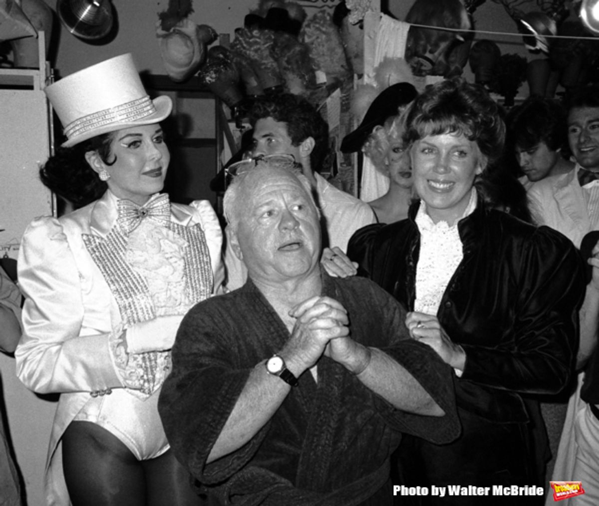 Ann Miller and Mickey Rooney with his wife Jan Chamberlain backstage after a Performance in 'Sugar Babies' at the Mark Hellinger Theatre, New York City. June 1980 at 