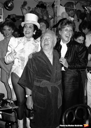 Ann Miller and Mickey Rooney with his wife Jan Chamberlain backstage after a Performance in 'Sugar Babies' at the Mark Hellinger Theatre, New York City. June 1980 @ BroadwayWorld Ann Miller and Mickey Rooney with his wife Jan Chamberlain backstage after a Performa Photo