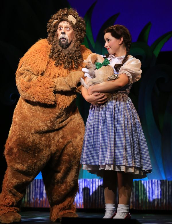 Dorothy (Kalie Kaimann), Toto (Murphy) and Lion (Victor Legarreta)  Photo