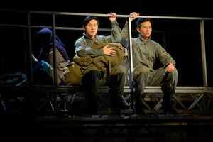 Nhan (Stephen Hu, left) and Quang (James Seol, right) fly a helicopter full of people to safety @ BroadwayWorld Nhan (Stephen Hu, left) and Quang (James Seol, right) fly a helicopter full of people Photo