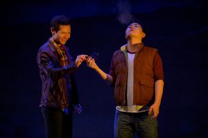 Quang (James Seol, left) and Nhan (Stephen Hu, right) share a joint during their trip Photo