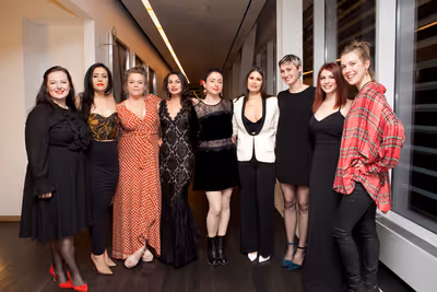 Director Danya Taymor, playwright Martyna Majok, and the cast of queens Photo