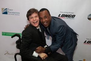 Micah Fowler and Sugar Ray Leonard at United Cerebral Palsy Los Angeles' Art of Care Gala where Fowler was honored with the Trailblazer Award. @ BroadwayWorld Micah Fowler and Sugar Ray Leonard at United Cerebral Palsy Los Angeles' Art of Care Photo
